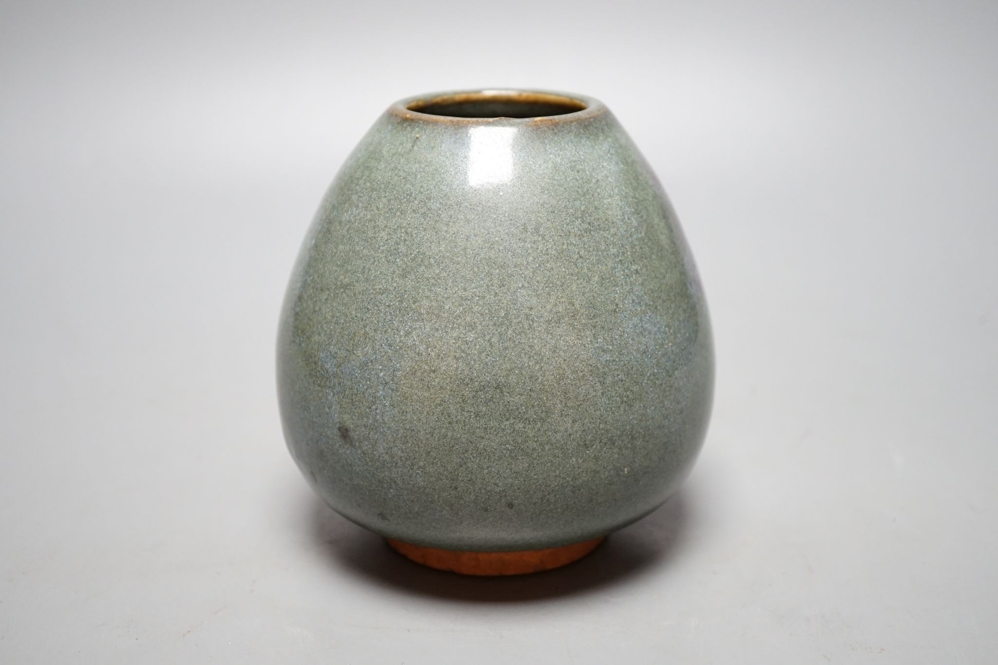 A Chinese jun-type type bud vase, Qing or earlier, 14 cms high.
